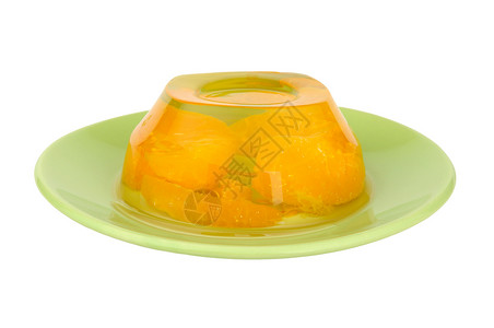 果冻甜点盘子白色绿色明胶黄色橙子小吃果味食物背景图片