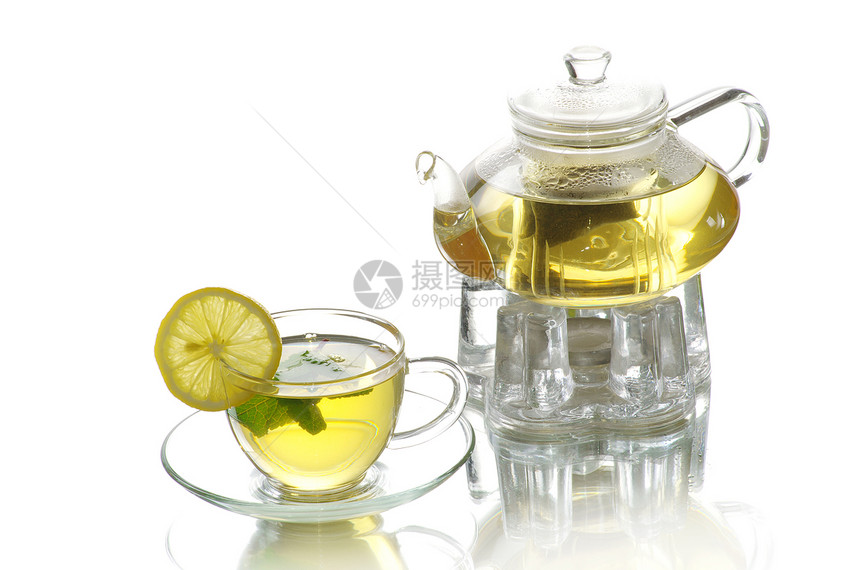 茶绿色液体橙子叶子一杯茶茶壶概念水平杯子棕色图片