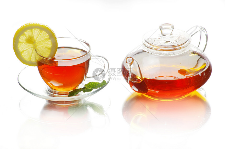 茶茶杯一杯茶棕色概念橙子杯子叶子茶壶玻璃液体白色图片
