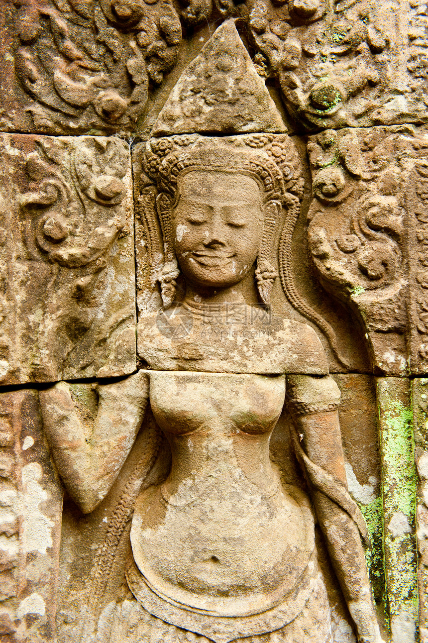 圣殿里有笑脸雕刻宗教旅行文化天空砂岩高棉语雕塑蓝色艺术图片