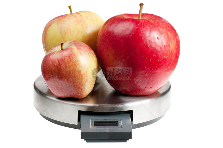 比例尺上的苹果生活女孩饮食测量活力暴饮暴食节食平衡营养食物图片