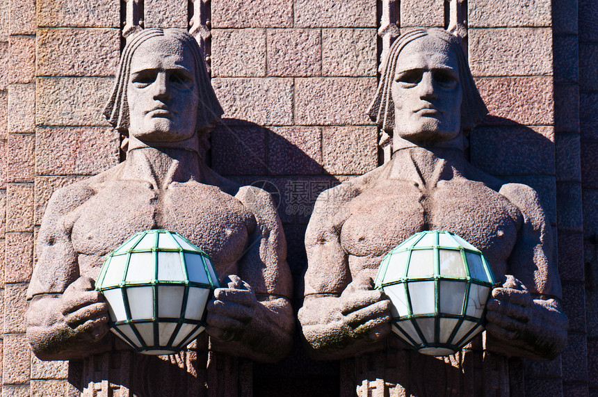 赫尔辛基火车站石头玻璃建筑雕塑车站历史性雕像图片