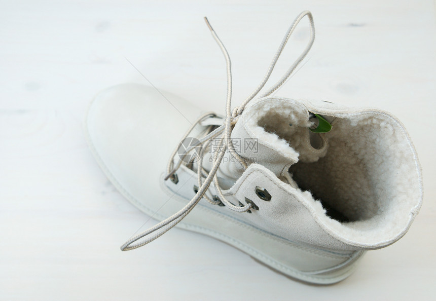 冬季靴白色运动鞋皮革配饰细绳绳索衣服图片