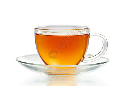 茶杯中的茶绿色概念液体玻璃白色一杯茶树叶杯子背景图片