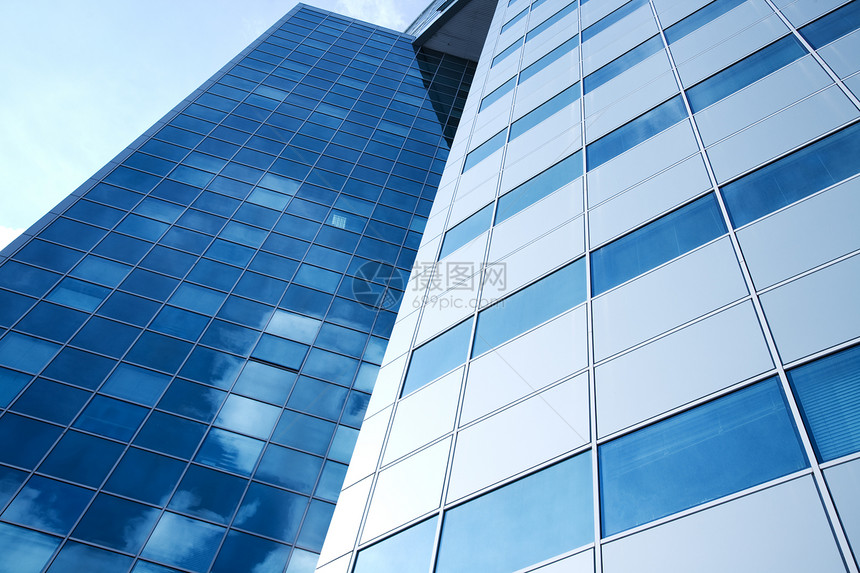 现代建筑蓝色商业贪婪摩天大楼玻璃窗户城市天空图片