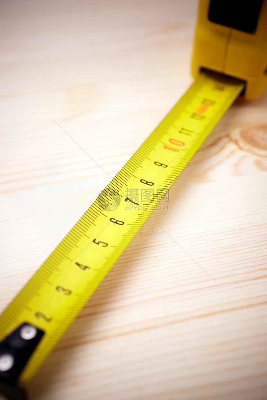 ea 磁带概念建造木头工具灯丝卷轴黄色木工丝带图片