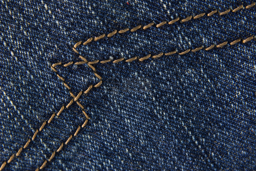 蓝色牛仔裤布质空白材料织物棉布接缝标签帆布服饰衣服缝合图片