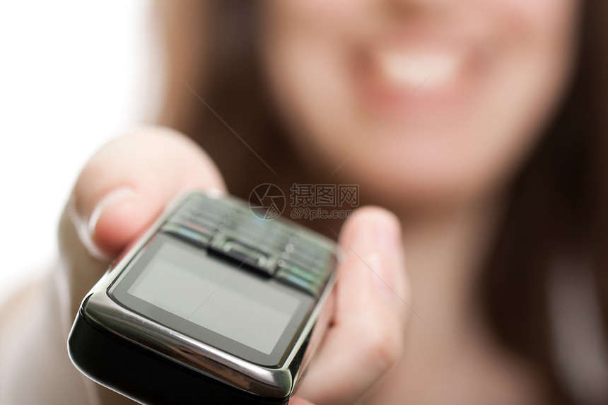 妇女手中的移动电话机动性商业键盘服务技术幸福成人相机人士电讯图片