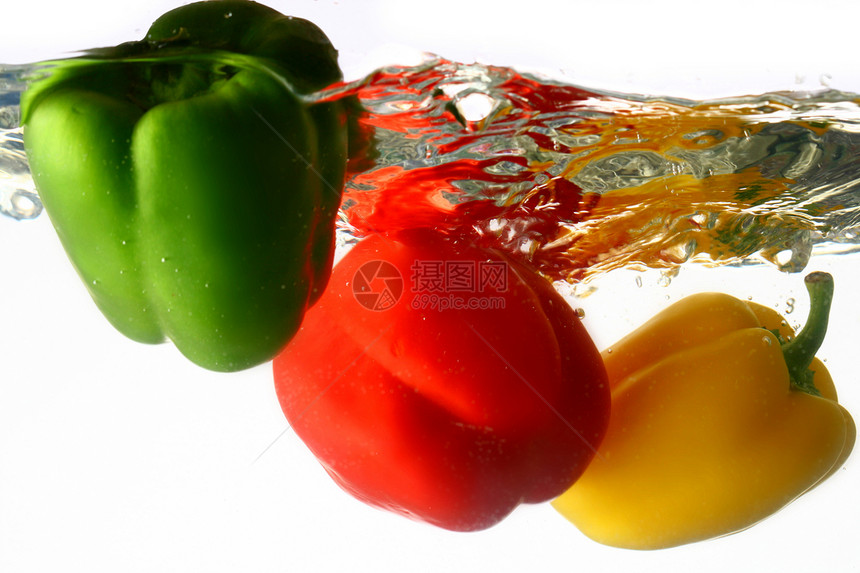 螺旋喷洒美食胡椒蔬菜橙子红辣椒香料沙拉食物营养宏观图片