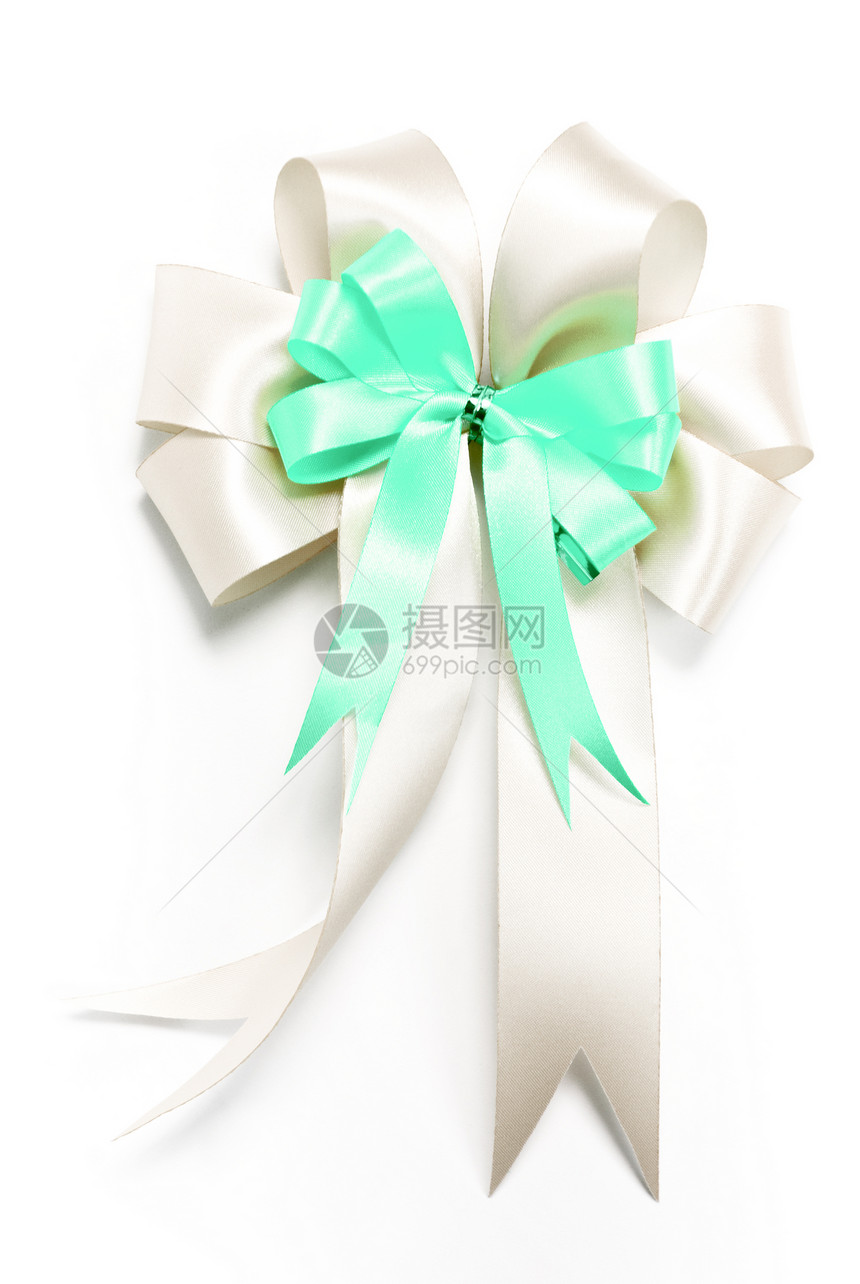 装饰礼盒的白色和绿色丝带弓图片