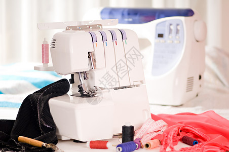 缝纫机刺绣纺织品筒管别针统治者配件包缝组织裁缝剪裁维修高清图片素材