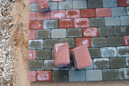 铺砖路砖块瓦工鹅卵石人行道石头路面街道背景图片