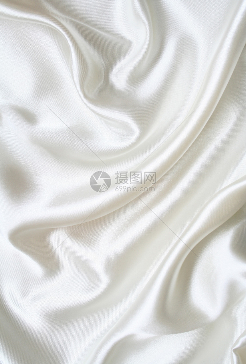 平滑优雅的白色丝绸作为背景曲线衣服涟漪新娘生产海浪版税投标织物寝具图片