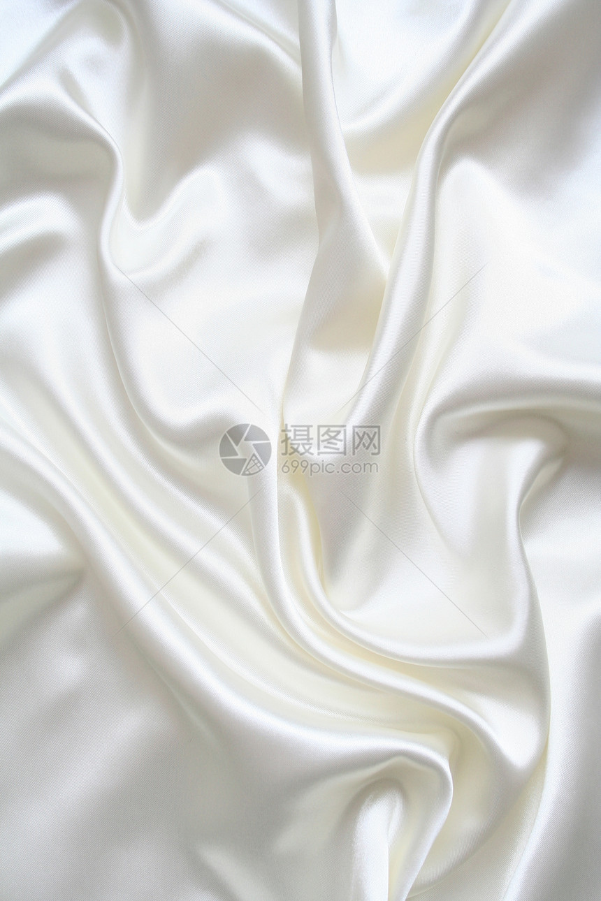 平滑优雅的白色丝绸作为背景纺织品织物投标材料涟漪曲线衣服布料银色新娘图片