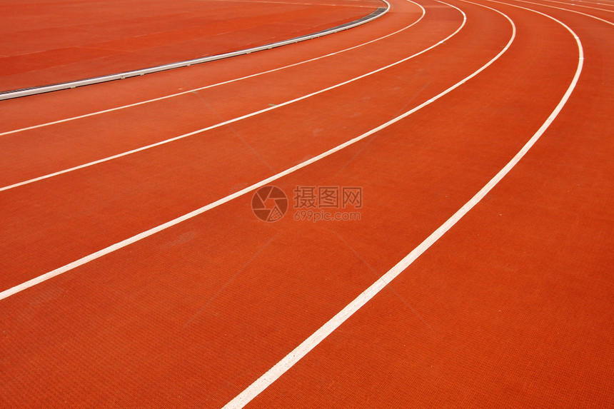 运动员赛跑轨道车道橙子闲暇竞赛课程短跑场地绿色速度跑步草地图片