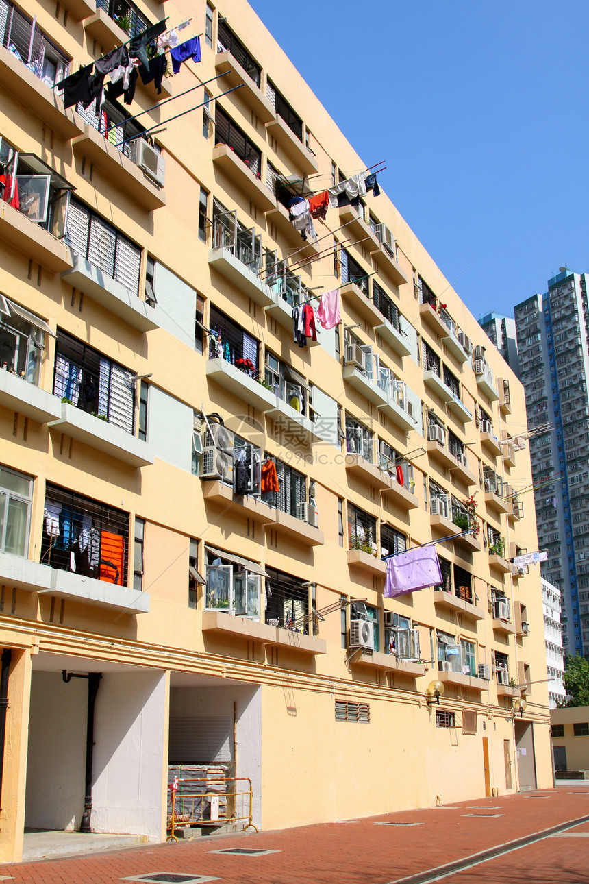 香港公寓楼区民众住宅蓝色火车城市建筑土地住房运输家庭图片