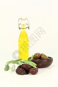 新鲜橄榄油冷压食物绿色油瓶金黄色橄榄枝美食家产物背景图片