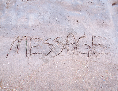 海滩上的留言数字热带写作背景图片