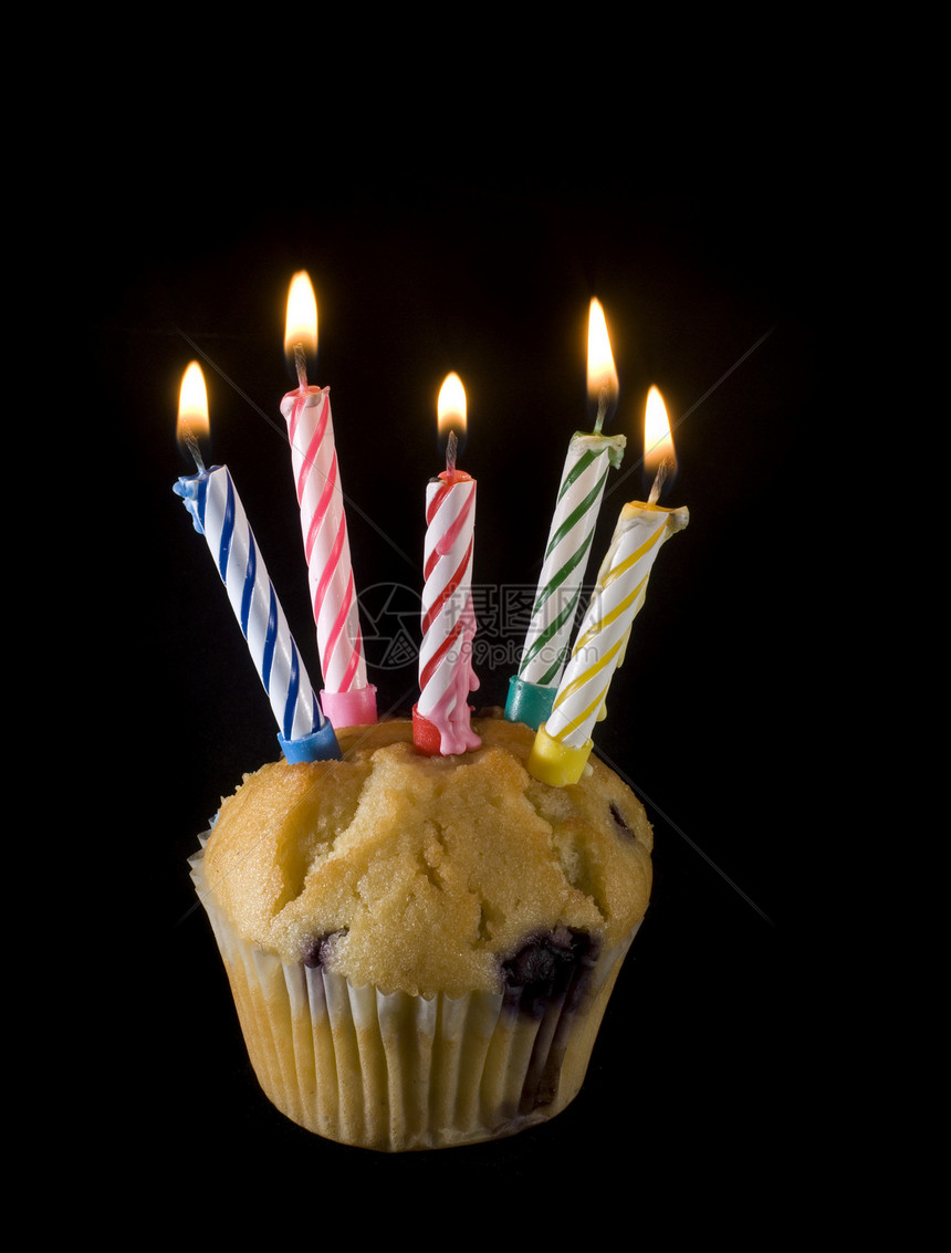 生日纸杯蛋糕甜点蜡烛念日派对螺旋白色食物庆典燃烧乐趣图片