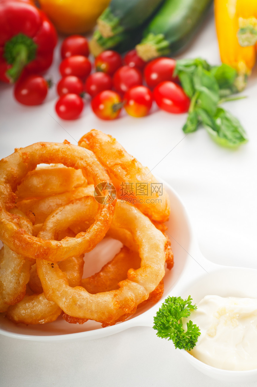 金金深炸洋葱环面包屑戒指育肥食物午餐饮食蔬菜美食盘子小吃图片