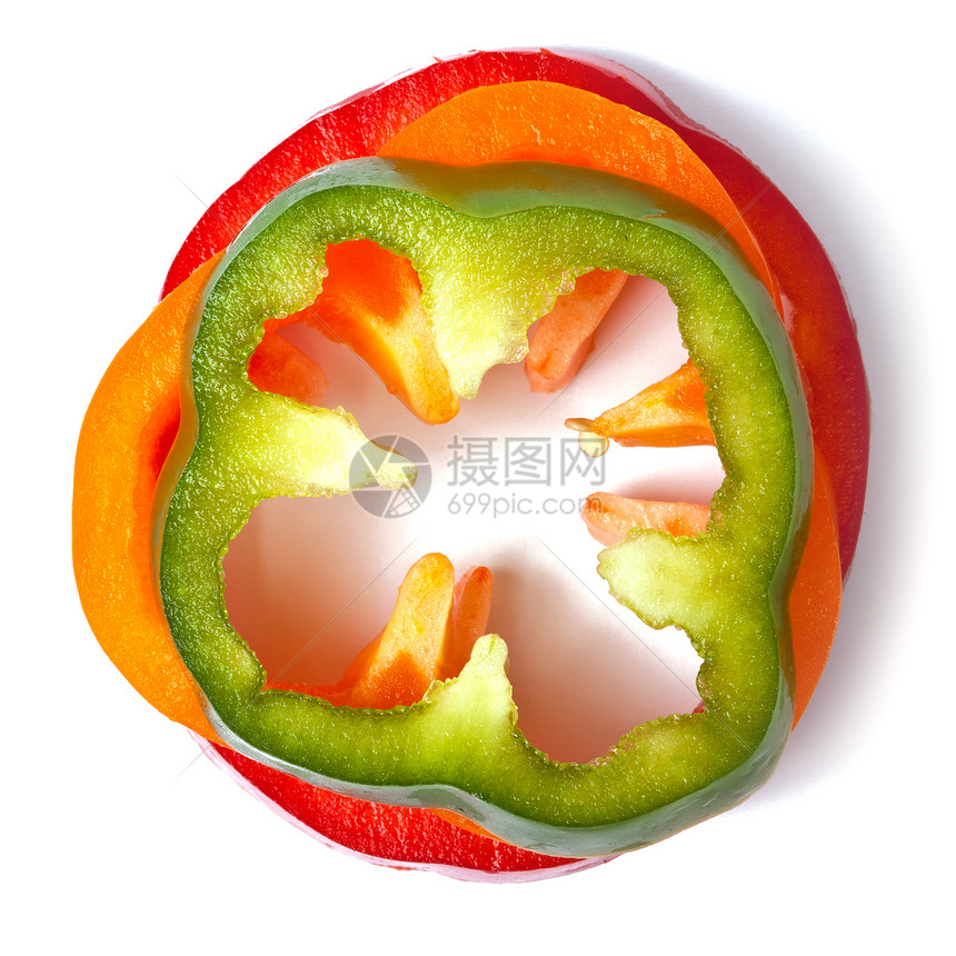 白色背景的橙绿色和红辣椒片食物营养红色蔬菜香料橙子辣椒图片