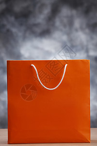 纸袋礼物橙子白色零售对象购物商品背景图片