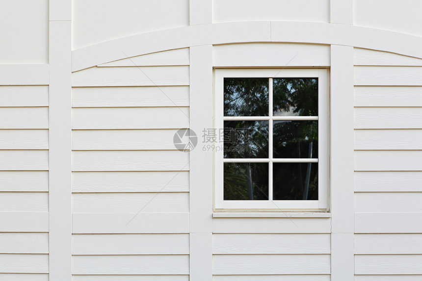 白墙上的窗口宏观场景文化窗户白色艺术房子灰色石头建筑图片