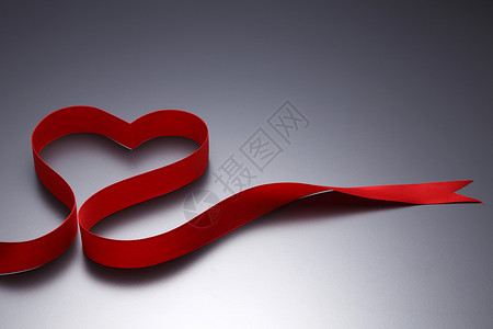 红色丝带纺织品浪漫庆典情人符号背景图片