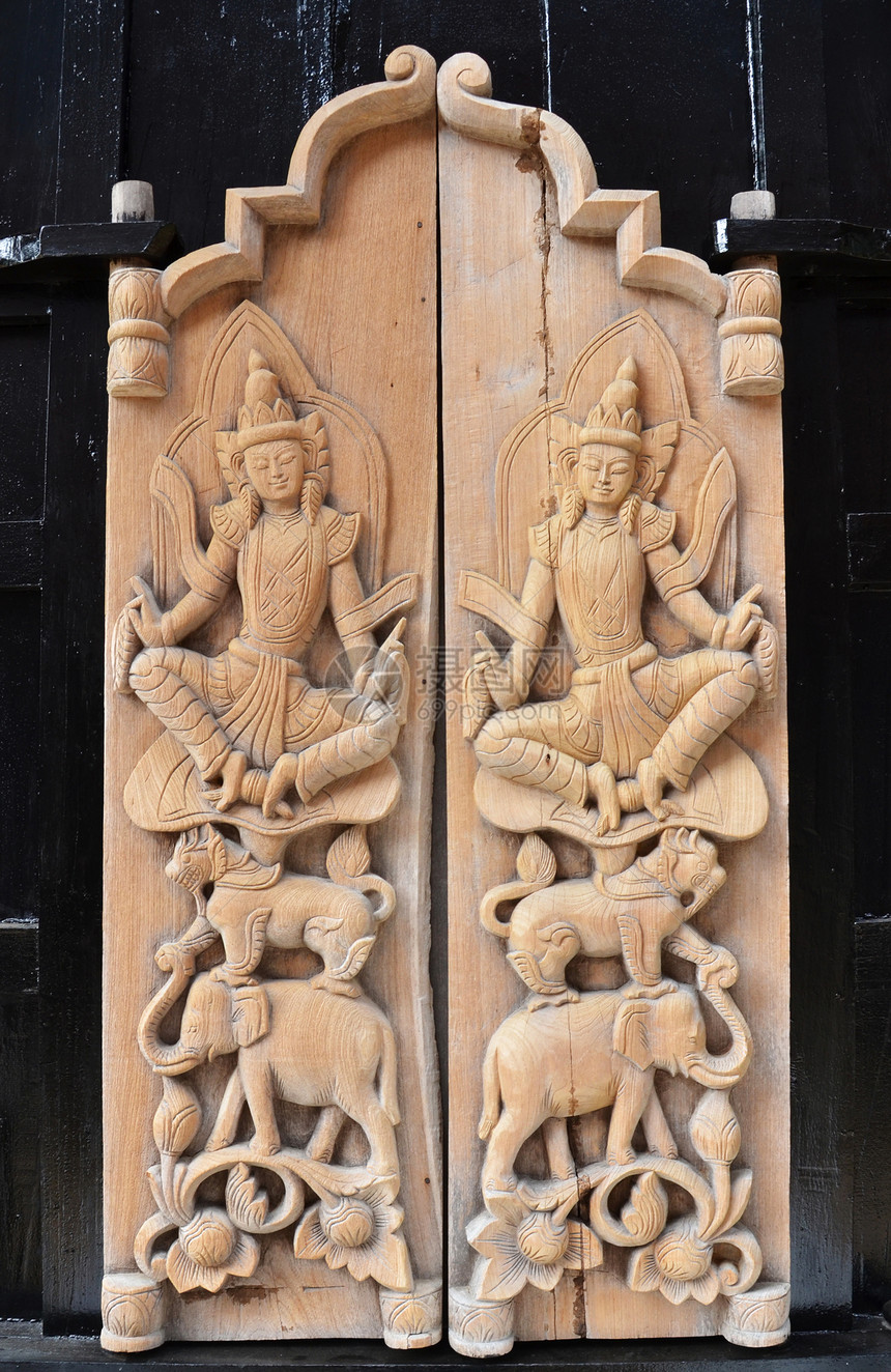 泰泰艺术蓝色雕刻寺庙木头天空古董入口遗产旅行宗教图片