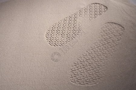 脚印鞋印干旱沙漠涟漪海滩对象鞋底背景图片