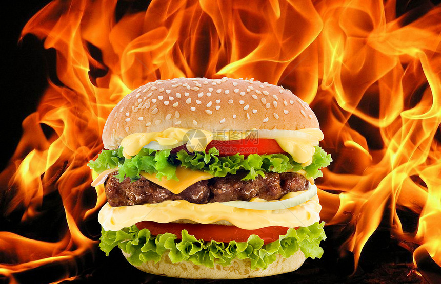 火焰中的奶酪汉堡图片