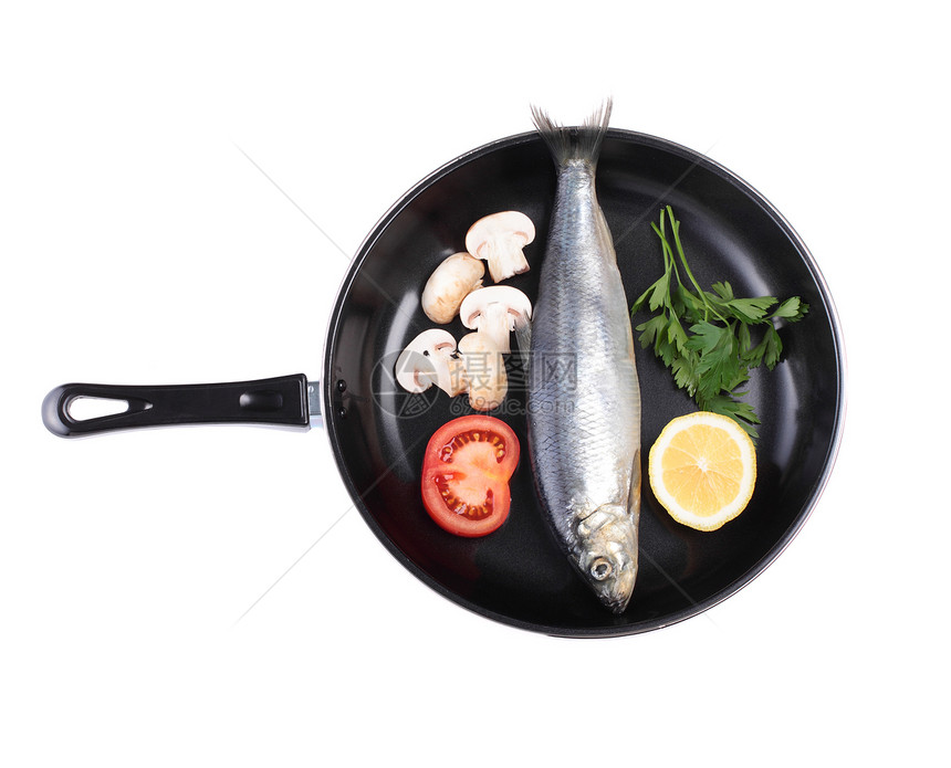 有蔬菜的鱼锅中的鱼海鲜柠檬午餐旗鱼海洋平底锅食物鱼片盘子图片