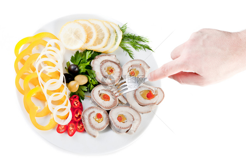 有蔬菜和橄榄的鱼洋葱叶子午餐饮食美食食物油炸海鲜牛扒柠檬图片