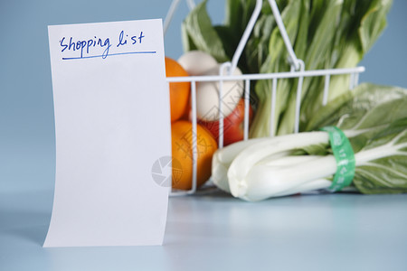 篮子食物纯色绿色杂货蔬菜白色购物金属橙子背景背景图片
