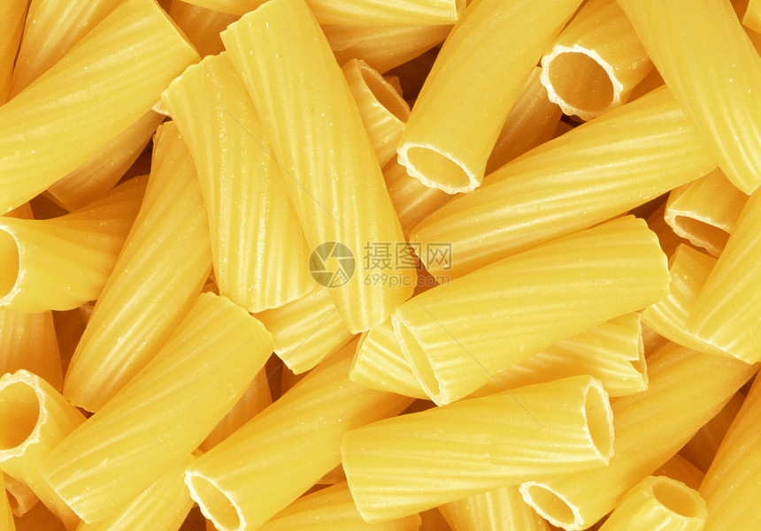 特写未经烹饪的全麦意大利意大利意面黄色团体营养食物文化饮食白色美味面条午餐图片
