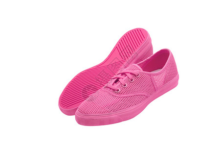 白色背景的孤立粉色鞋子蕾丝橡皮鞋带运动鞋运动背景图片