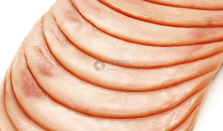 从白底的香肠切片中分离出来的堆叠白色红色粉色养分食物火腿图片
