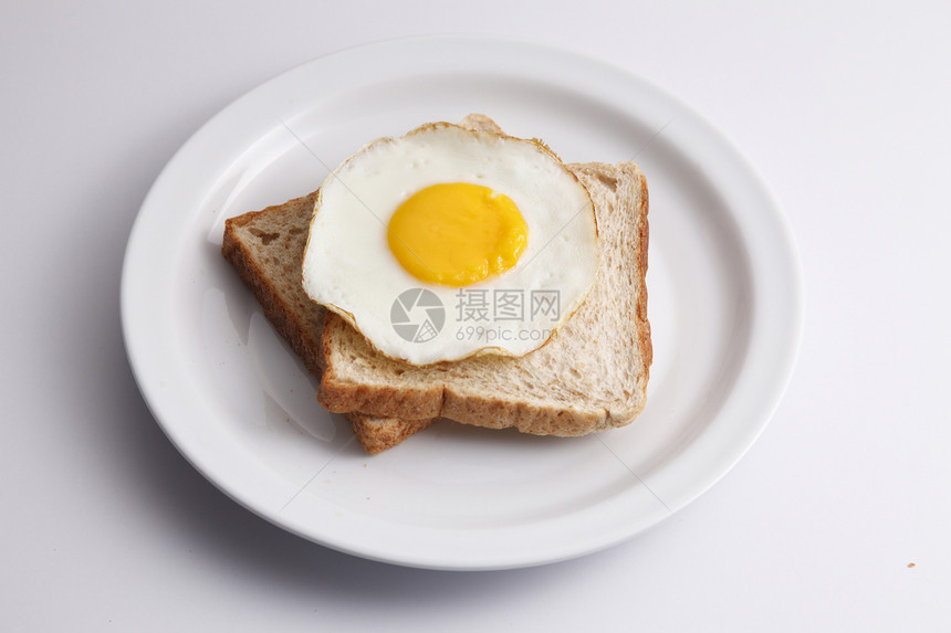 餐饭早餐硬皮白色油炸盘子蛋黄奶制品全餐食物图片