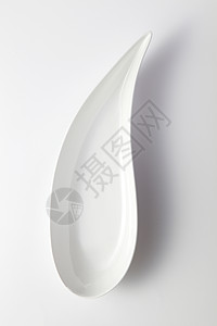 空板设计师形状椭圆形盘子商品餐具白色晚餐背景图片