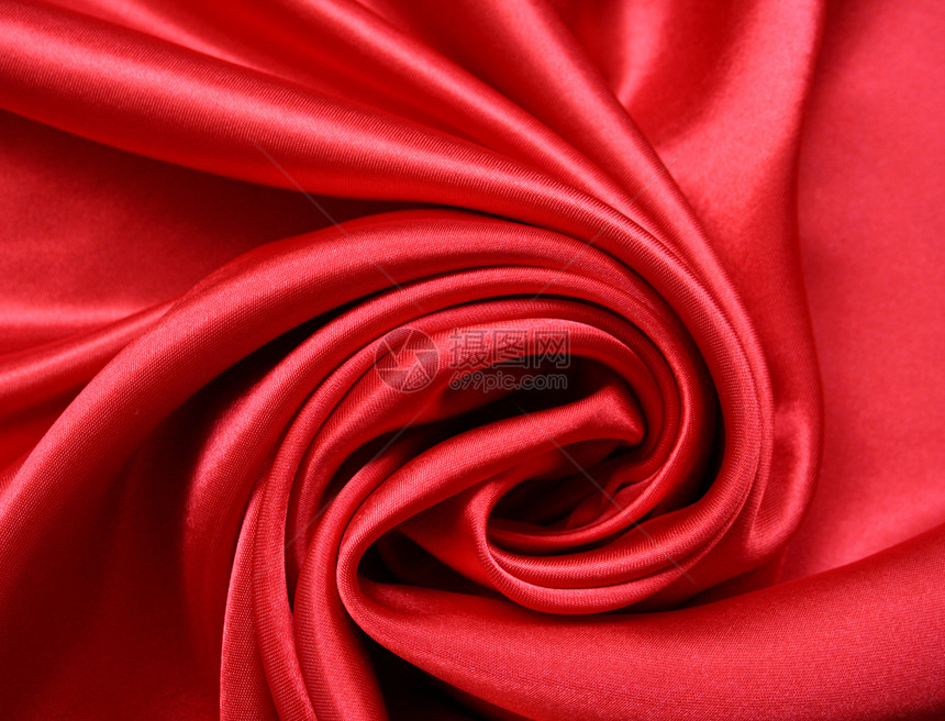 平滑的红丝绸背景材料胭脂海浪曲线窗帘布料投标奢华热情纺织品图片