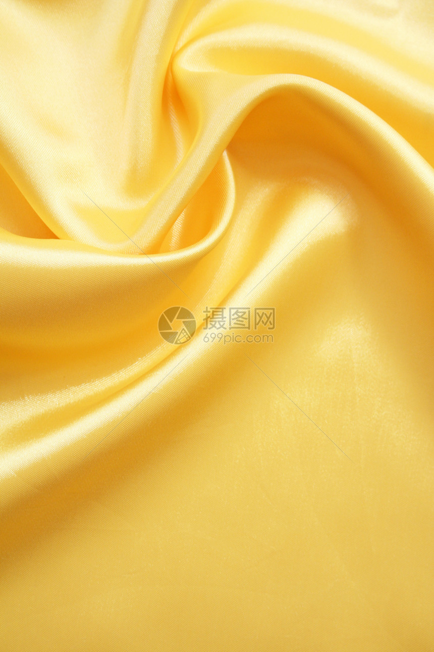 平滑优雅的金金丝绸曲线材料海浪折痕纺织品布料涟漪织物黄色投标图片
