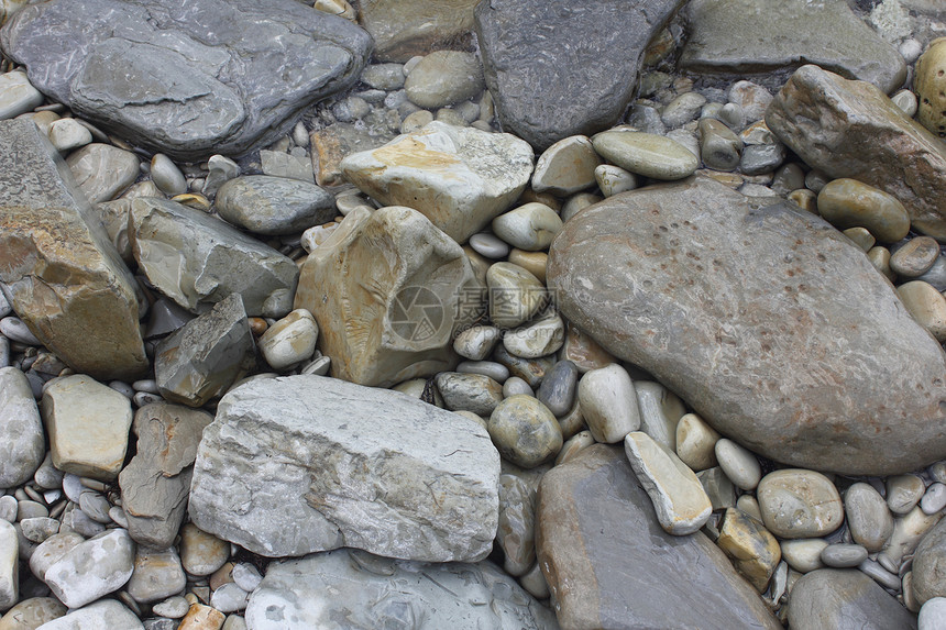 石头背景支撑灰色圆形海岸海滨卵石图片