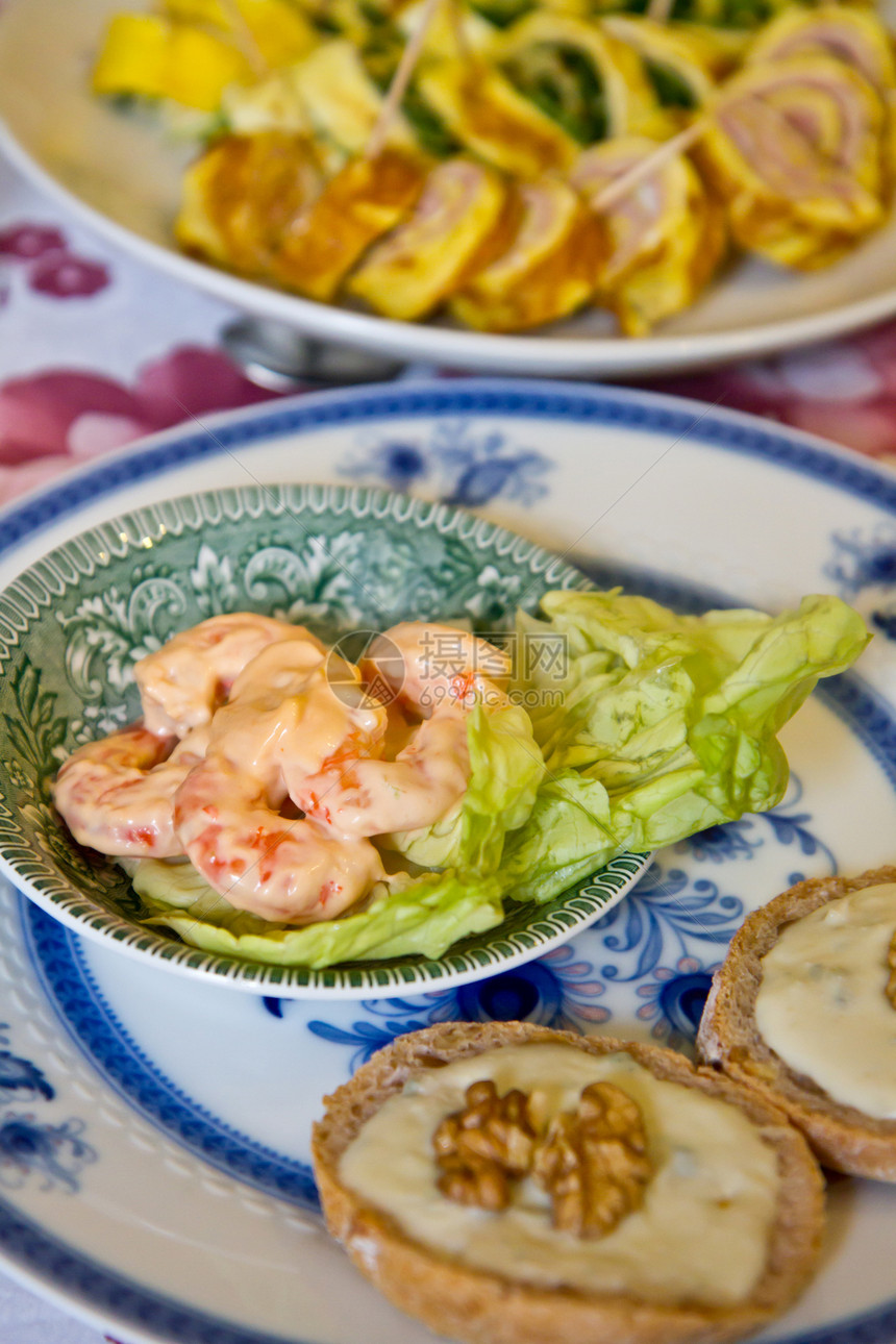 开胃菜盘子坚果贝类沙拉奶油午餐点心节日粉红食物图片