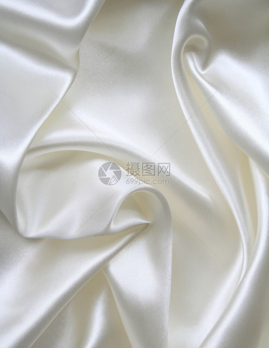 平滑优雅的白色丝绸作为背景寝具版税衣服奢华折痕纺织品织物曲线材料新娘图片