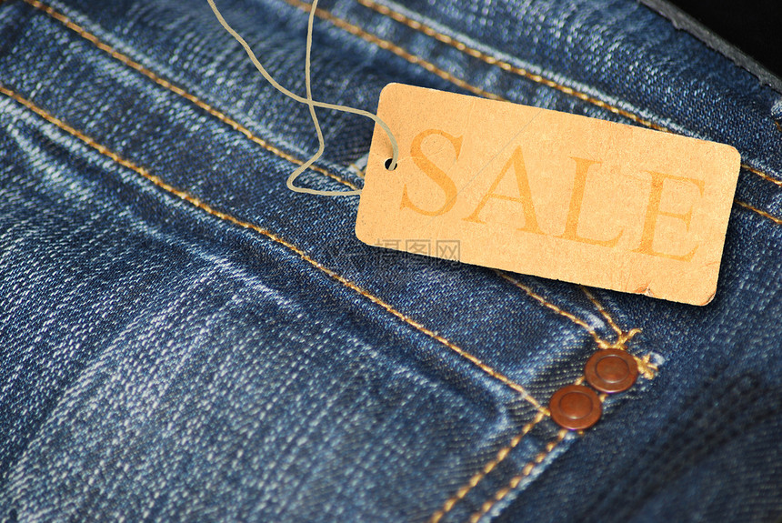 配有销售标签的Jeans棕色店铺购物牛仔裤出口绳索衣服细绳购物中心价格图片
