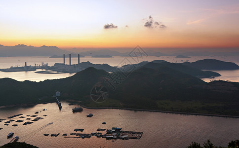 久久丫香港Lamma岛车站农村钓鱼太阳海岸线橙子日落蓝色爬坡天空背景