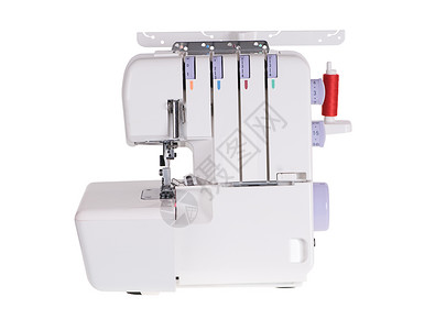 缝纫机塑料白色针线活机器包缝机械工具裁缝白色的高清图片素材