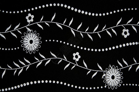 白花型黑织物白色投标黑色布料材料纺织品植物背景图片