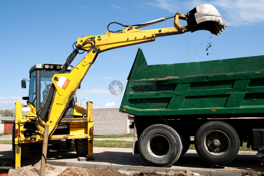 挖土机装载倾卸卡车车辆装载机挖掘机械搬运工挖掘机拖拉机地球建造图片