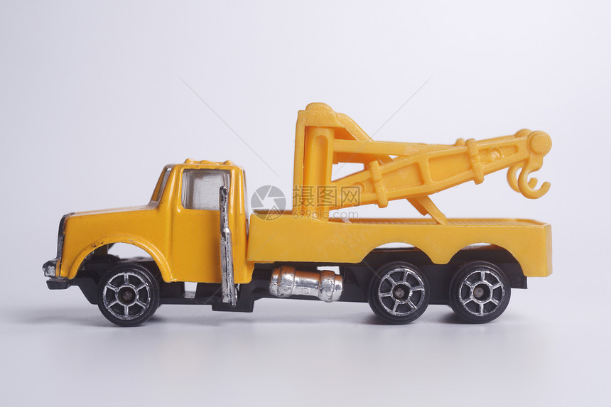 玩具部门灰尘运输黄色白色拖车卡车车轮图片